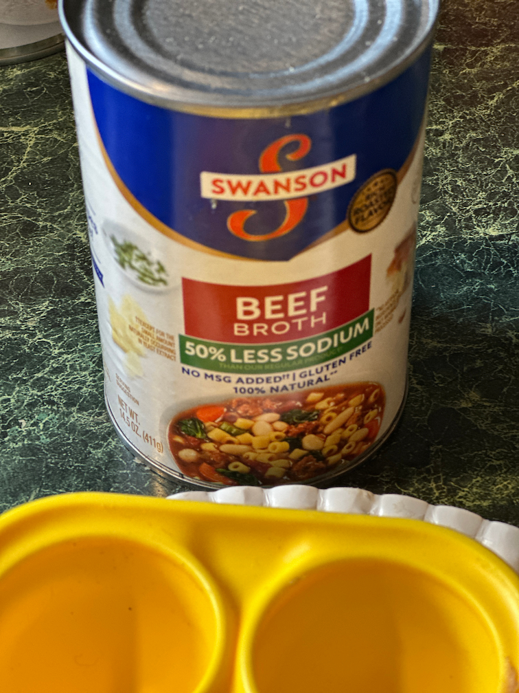 can of beef broth and pupsicle treat tray