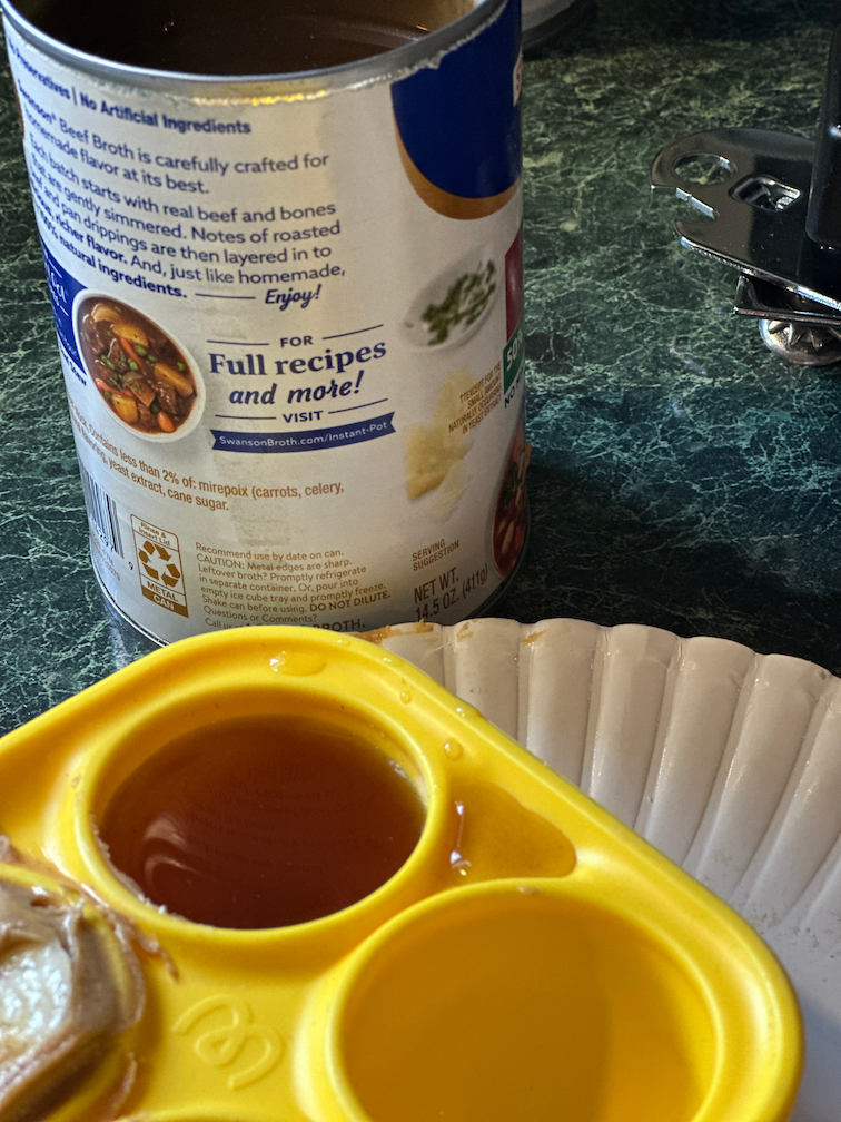 can of beef broth and pupsicle treat tray